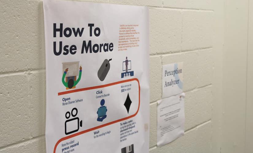 A photo of a LUCIA lab poster that explains how to use the MORAE usability testing software. 