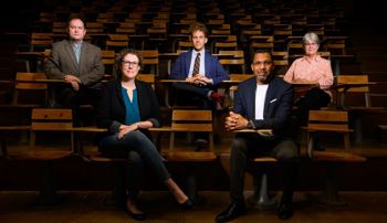 Auburn faculty Keith Hebert, Melissa Blair, Elijah Gaddis, Abdul-Khaliq Murtadha and Nan Fairley in a classroom