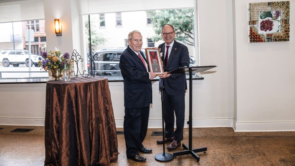 Curtis Liles accepting an award for induction into the Alabama Lawyer Hall of Honor