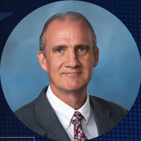 Red, white and blue graphic with Auburn University's 250 years of America logo alongside a photo of Professor Steven Brown