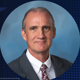Red, white and blue graphic with Auburn University's 250 years of America logo alongside a photo of Professor Steven Brown
