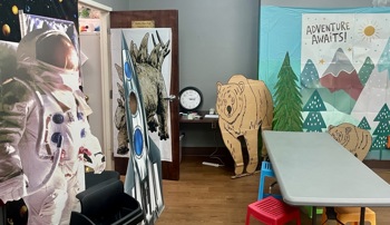 The Elba Public Library’s community room is decorated for a variety of summer reading programs.