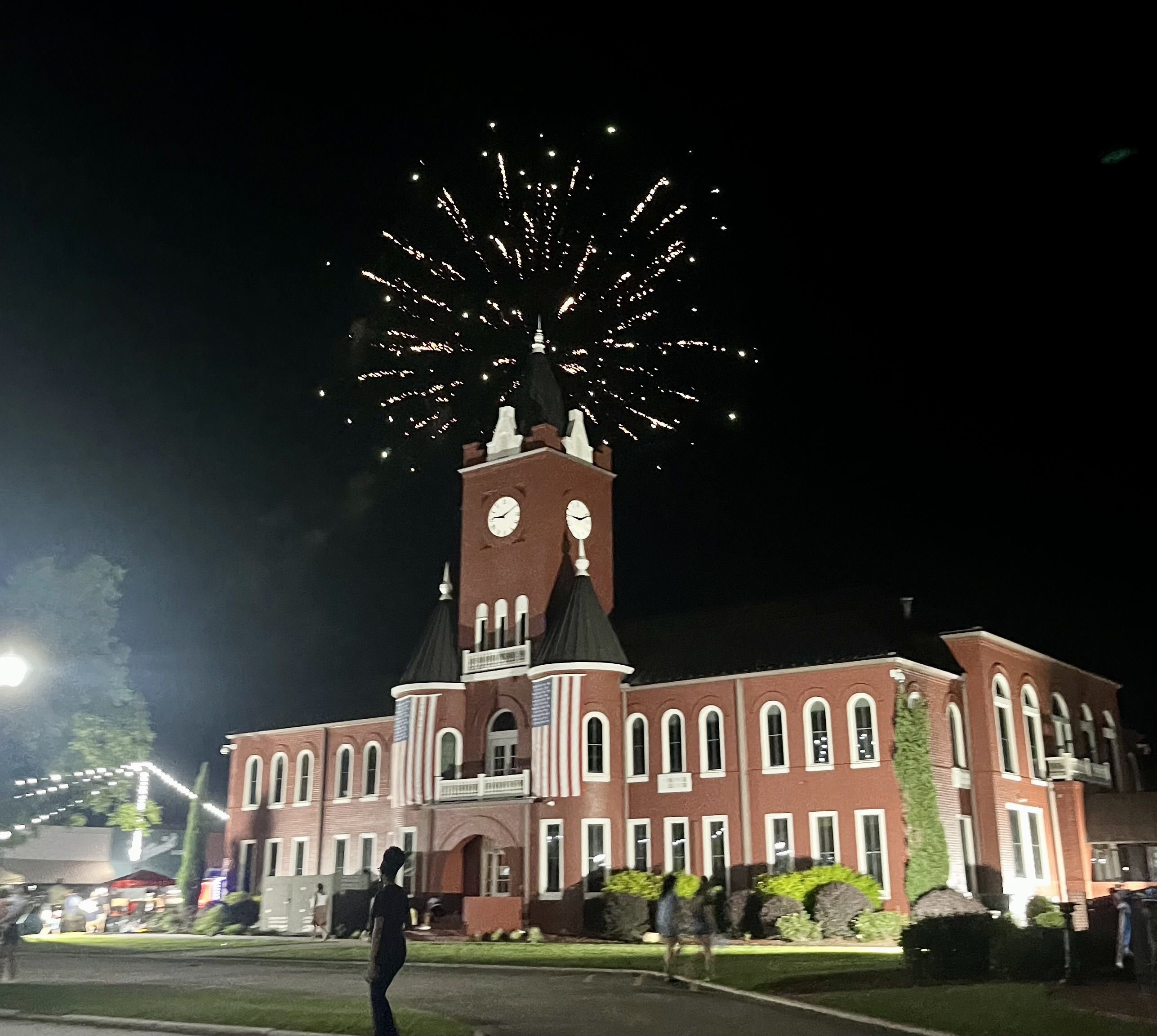 Fireworks illuminate Elba’s historic courthouse on the downtown square.