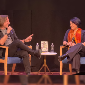 Matthew Mercer and Emily Friedman speaking on stage 