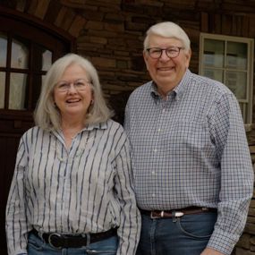 Bill and Linda Lee smiling for a photo
