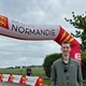 Ethan Davis at the finish line of the Normandy Running Festival