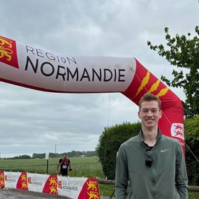 Ethan Davis at the finish line of the Normandy Running Festival