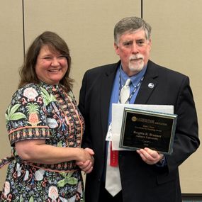 Brigitta Brunner accepting the Sisco Award for Excellence in Teaching