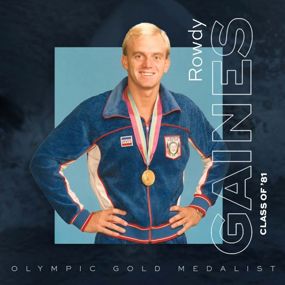 Rowdy Gaines wearing Olympic gold medal