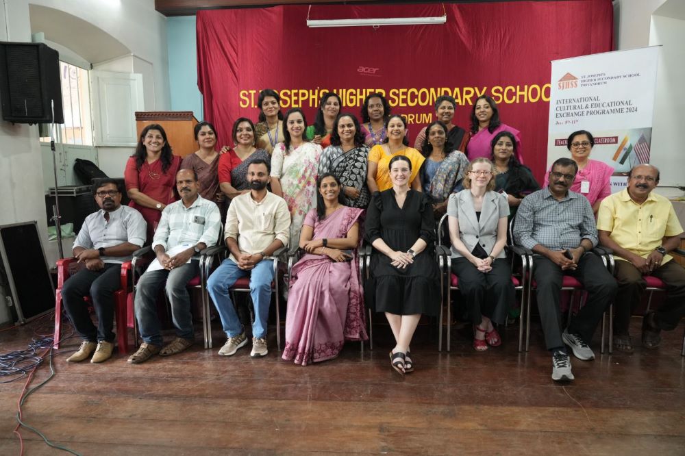 Laura West Ramkorun with the St. Joseph's School staff