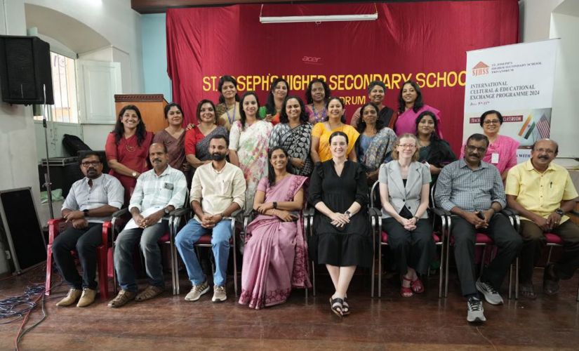 Laura West Ramkorun with the St. Joseph's School staff