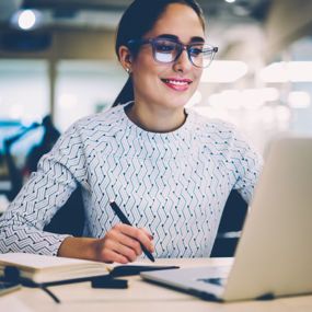 Woman looking at a laptop computer screen