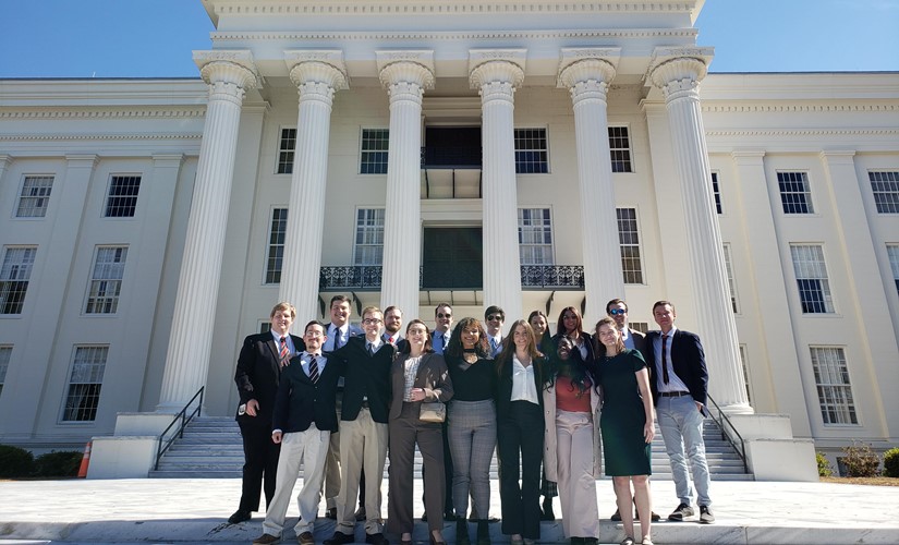 CLA students stand outside the Alabama State House