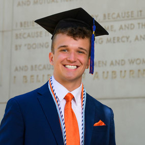 Vince Wolfram wearing a graduation cap