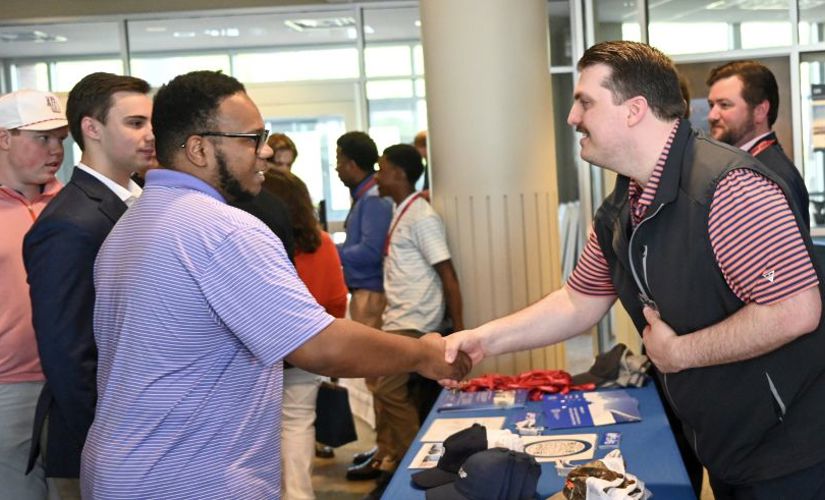 two people shaking hands