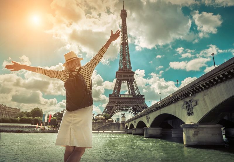 girl looking at Eiffel Tower