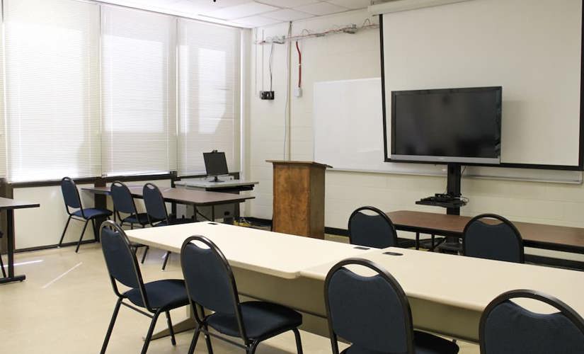 A photo of the LUCIA lab's experimental room, 1202, where focus groups often take place. 