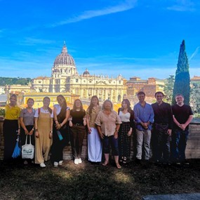 The Rome Summer Archival Seminar group posing for a photo in front of the Vatican