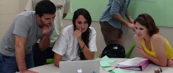 students sitting at table