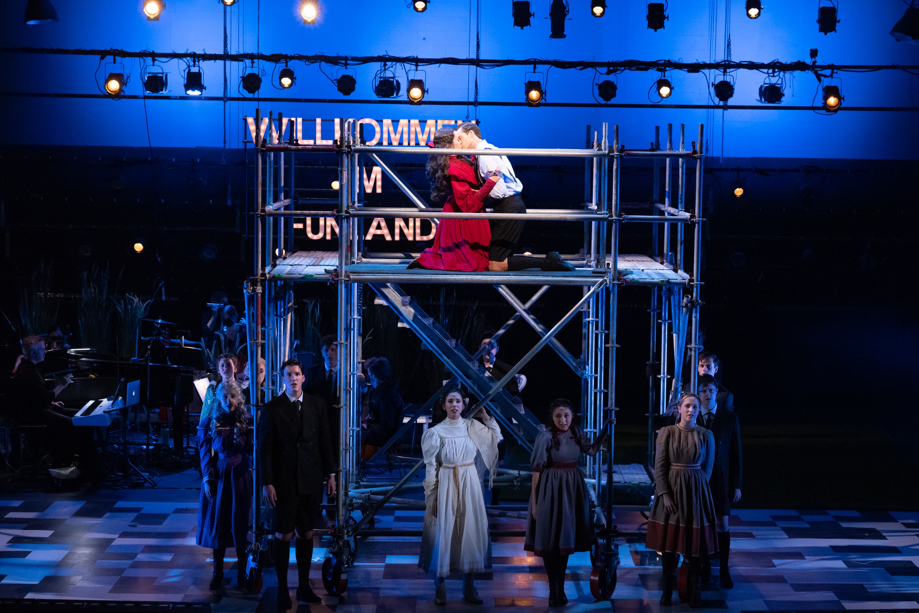 Spring Awakening production photo, including scaffold and all members of cast singing