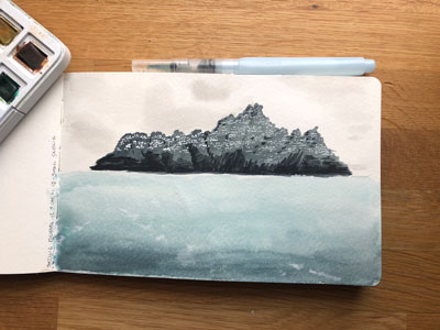 watercolor drawing of a mountain