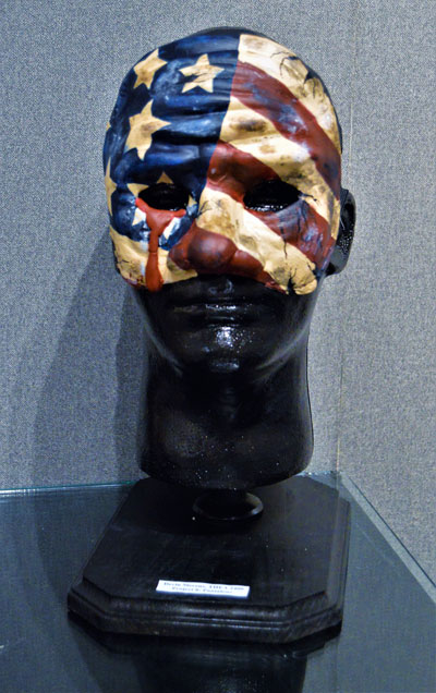 mask painted as the american flag on head stand