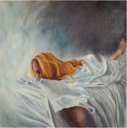 woman lying in sheets